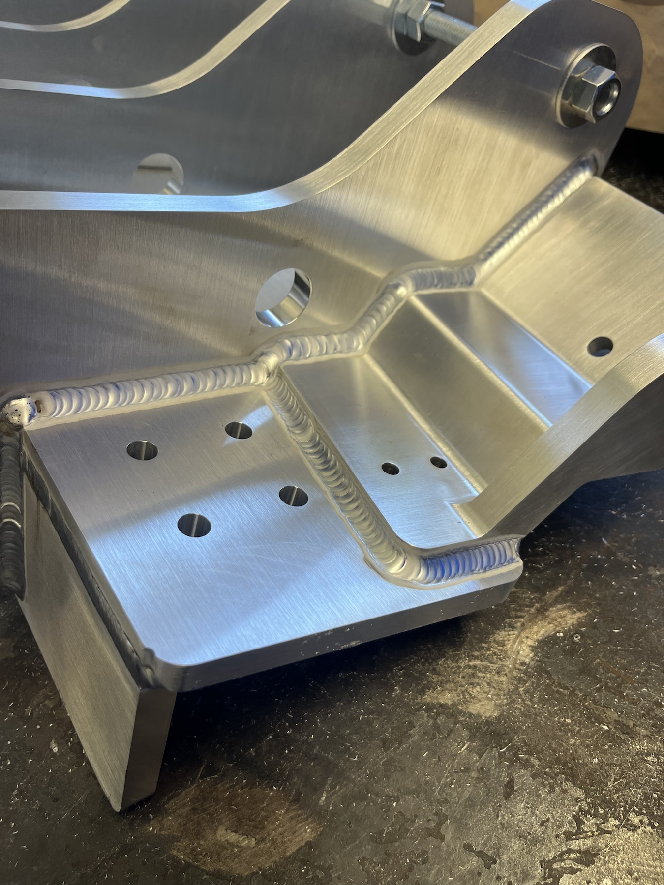 Close view of a precision aluminum weldment fabricated by Jones