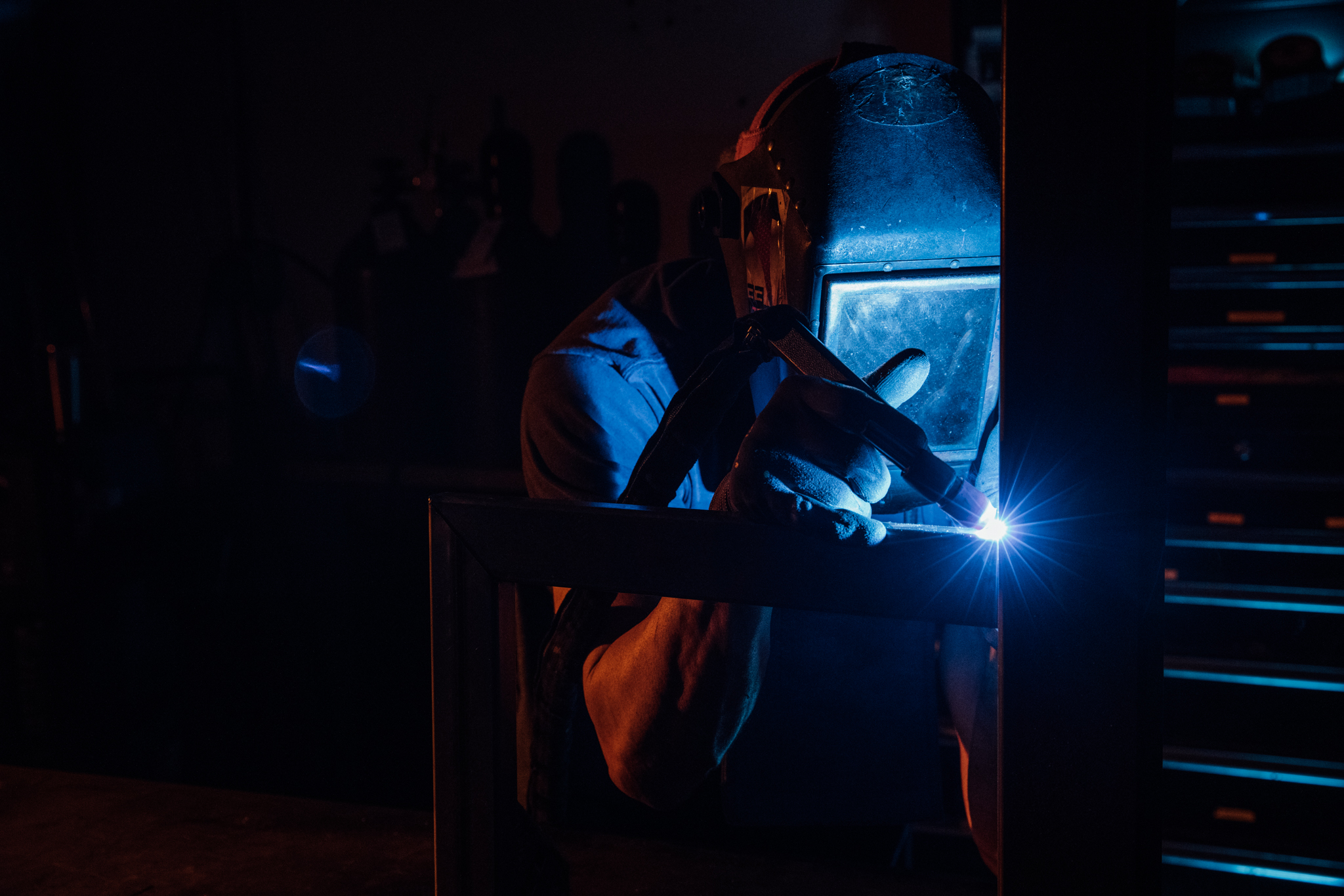 Jones welder fabricating a steel frame in the shop