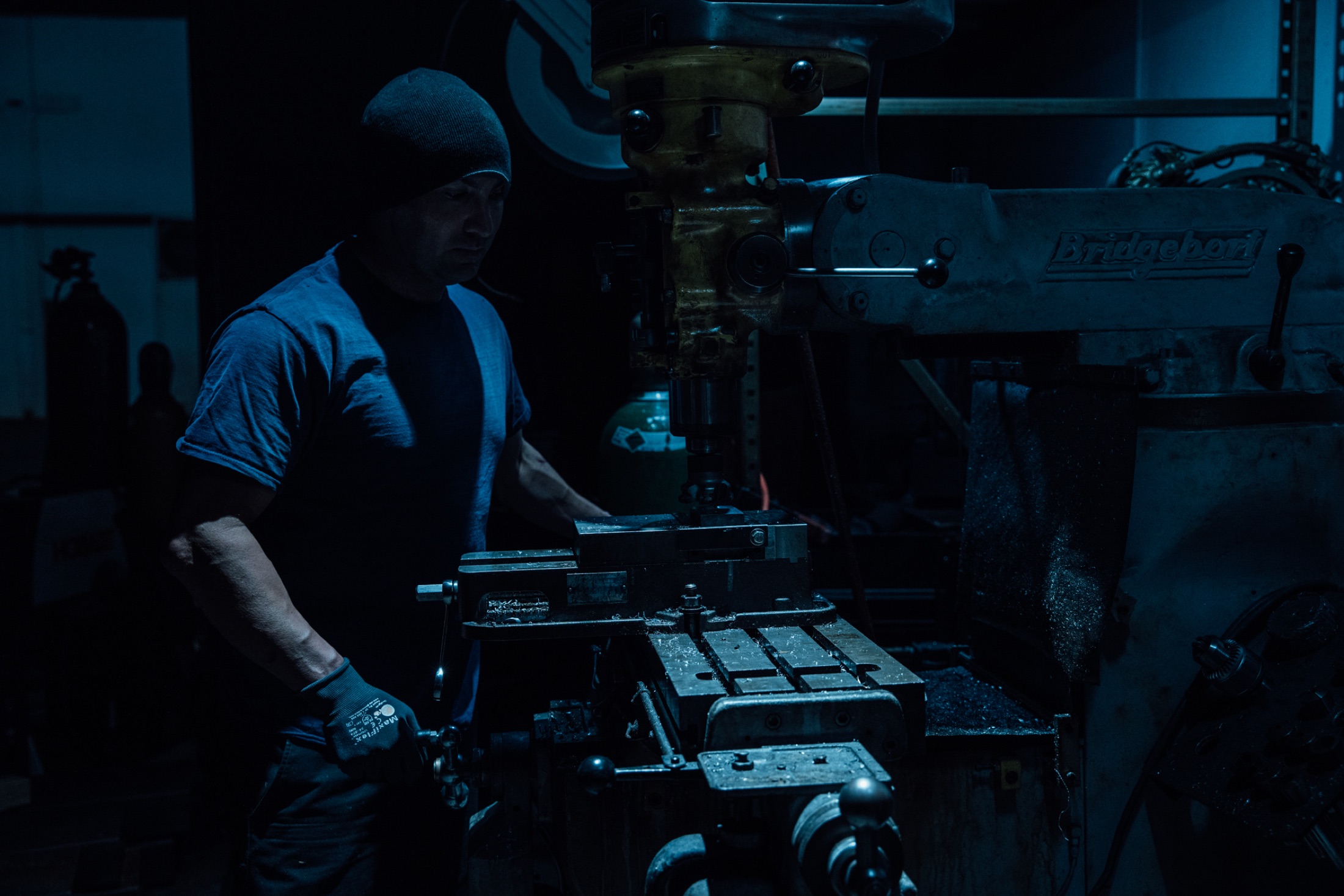 Jones team member operating an industrial milling machine