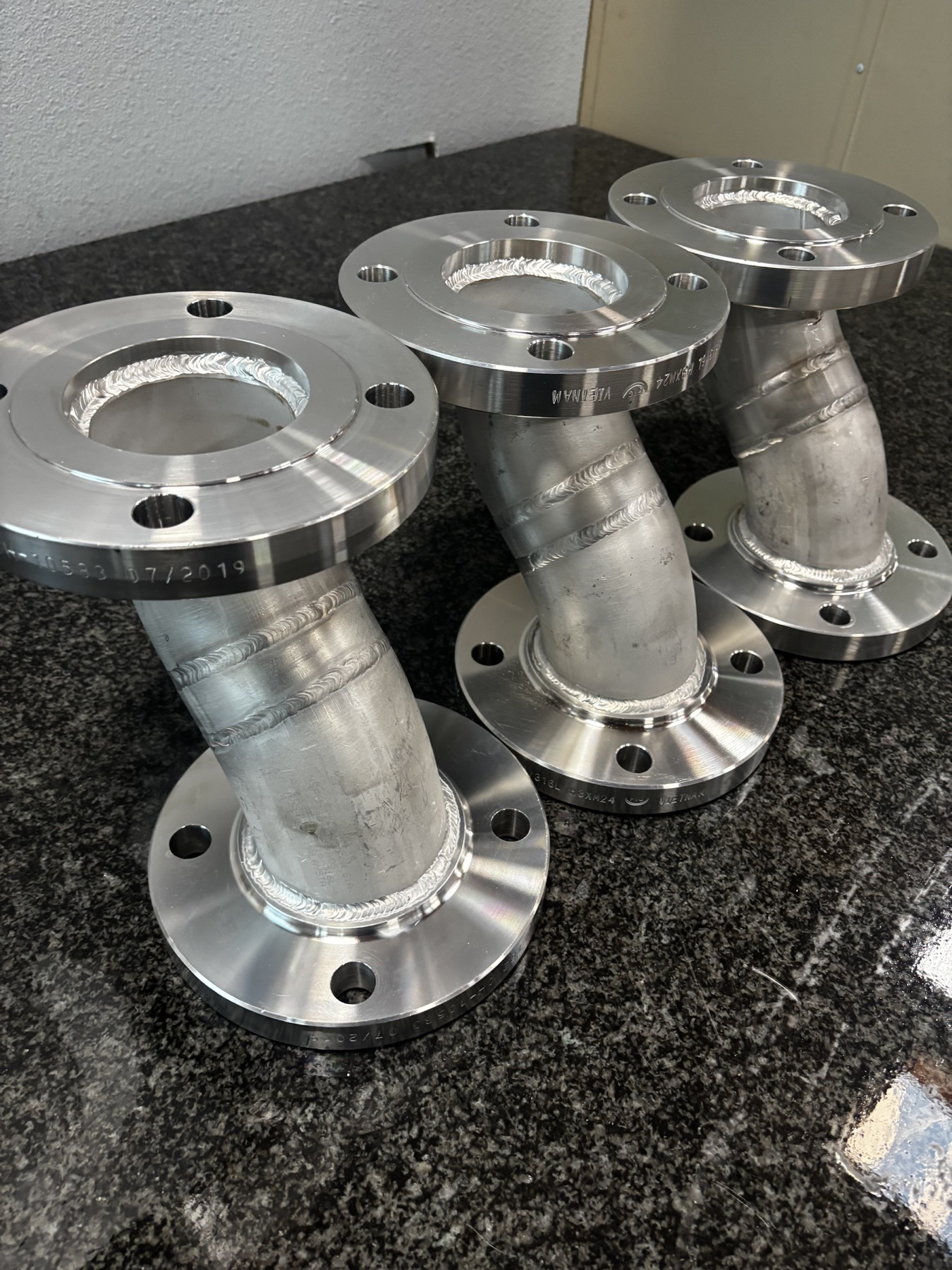 Set of finished stainless process spools fabricated by Jones